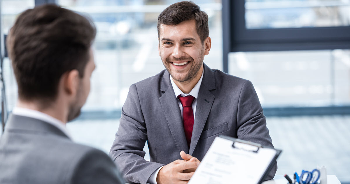 Man applying for a job as an insurance broker in Australia.